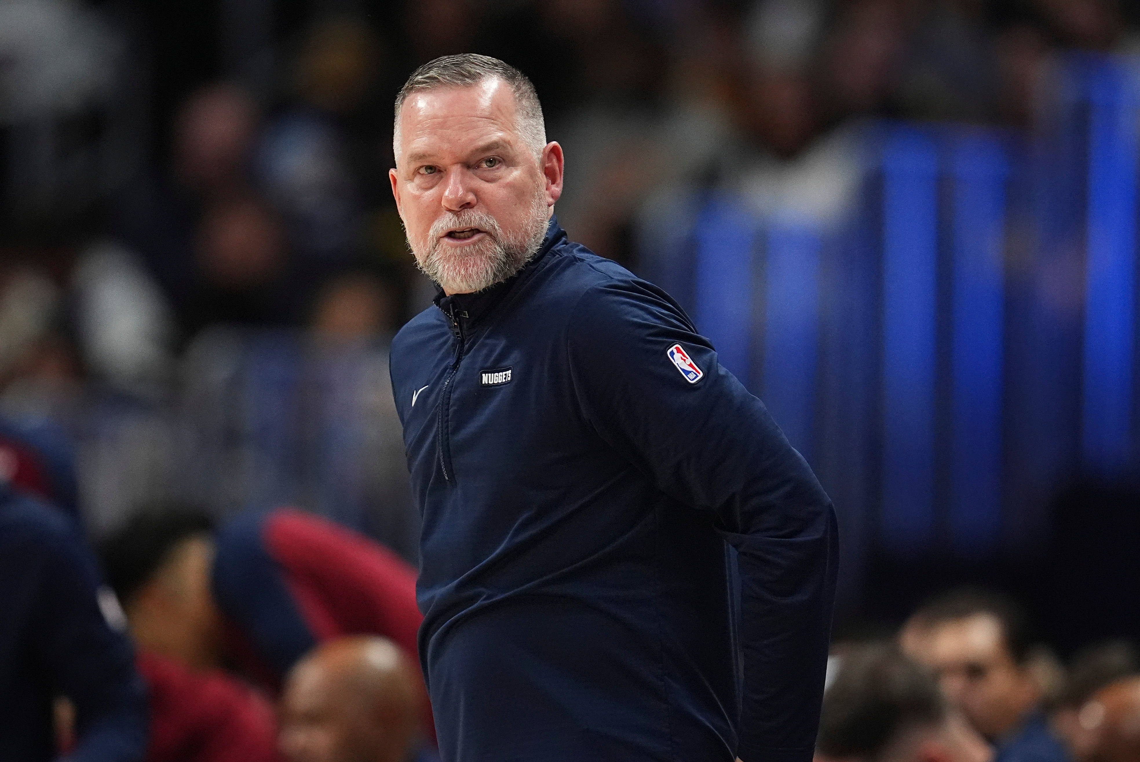 FILE - Denver Nuggets head coach Michael Malone stands on the sideline during the second half of an NBA basketball game April 1, 2025, in Denver. 