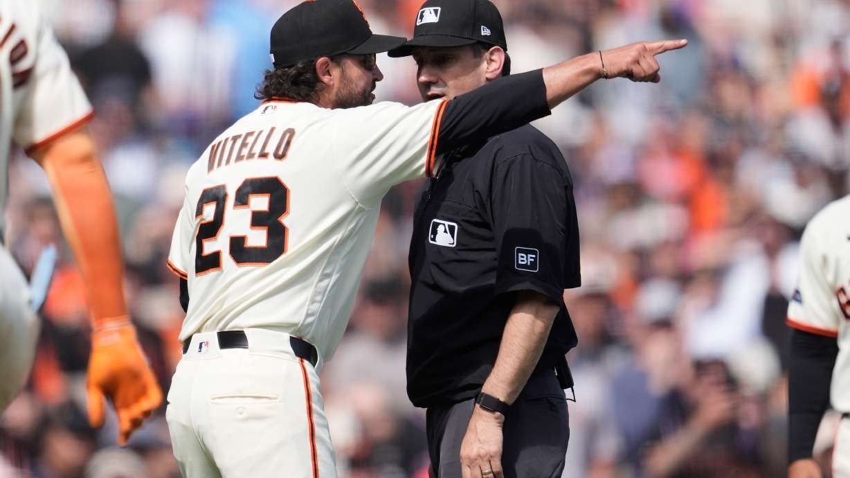 San Francisco Giants manager Tony Vitello (23) gestures after being ejected by umpire David Rackley, right, during the seventh inning of a baseball game between the Giants and the New York Mets in San Francisco, Sunday, April 5, 2026.