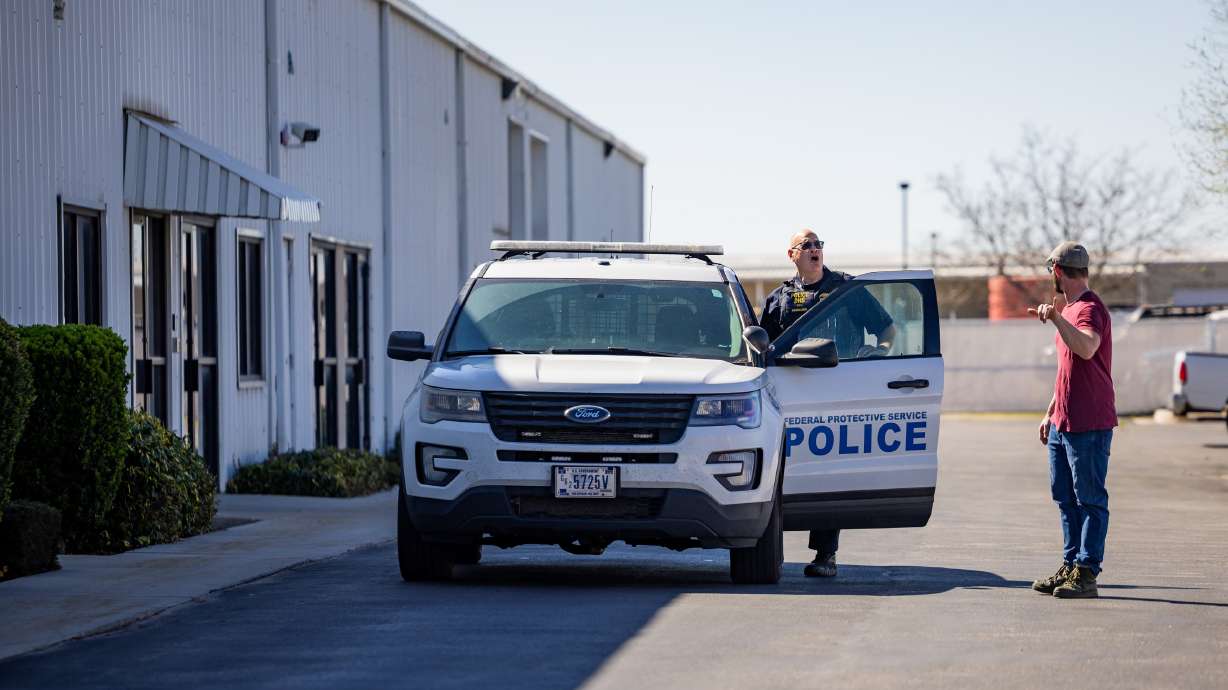 A confrontation off I-15 in Roy on March 30 offers a glimpse into the immigration enforcement action unfolding around Utah. The March 20 photo shows an immigration official outside an Ogden Immigration and Customs Enforcement office.