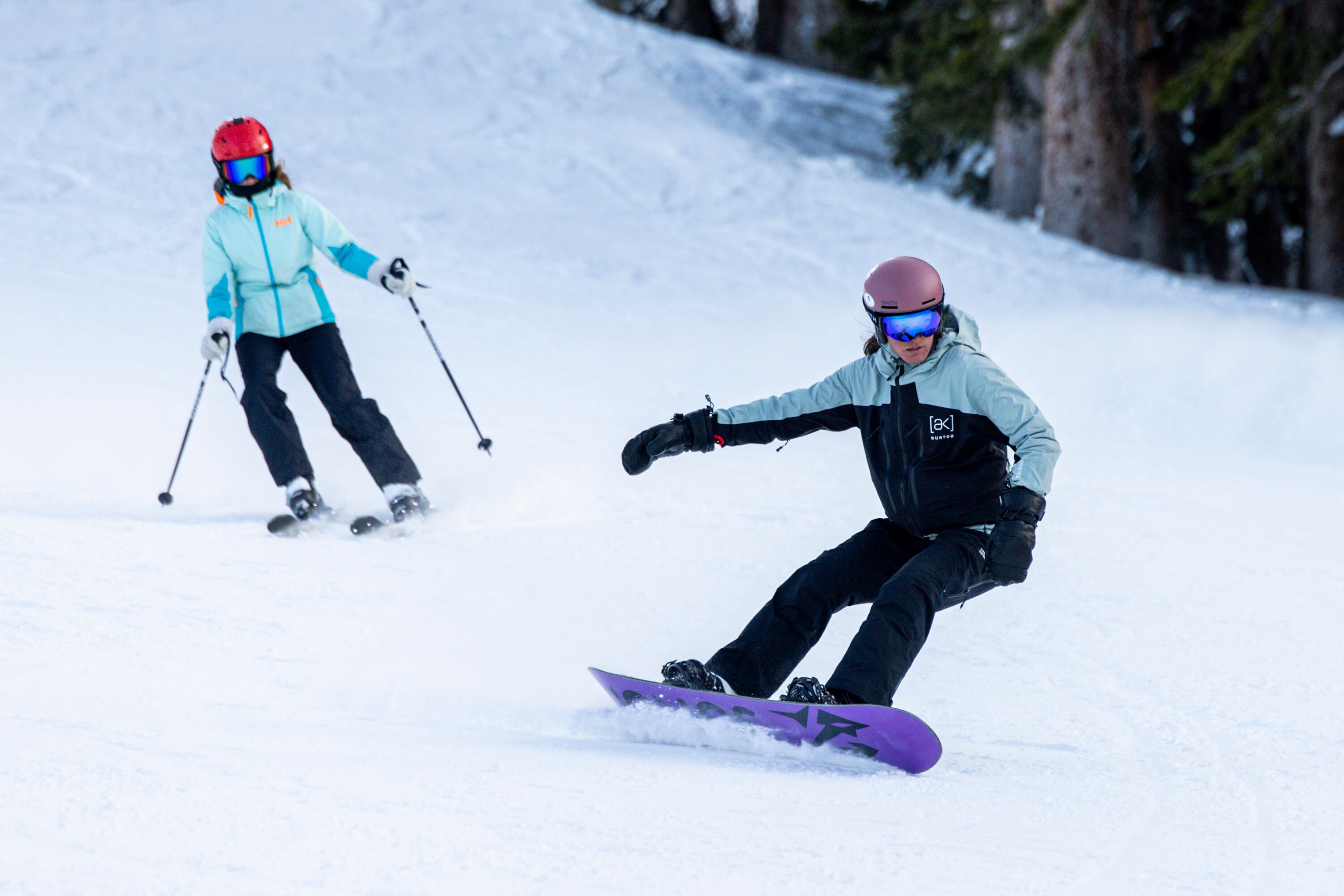 Riders make their way down the slopes at Brighton Ski Resort in Brighton on Feb. 22. Most skiers enjoy using season passes more, but it raises a question of being better or worse off.