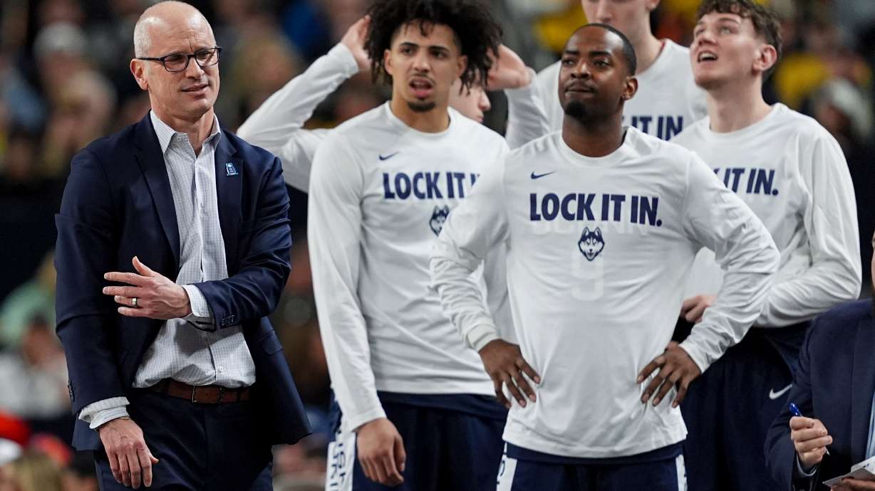 UConn head coach Dan Hurley, left, reacts during the second half of the NCAA college basketball tournament national championship game against Michigan at the Final Four, Monday, April 6, 2026, in Indianapolis.