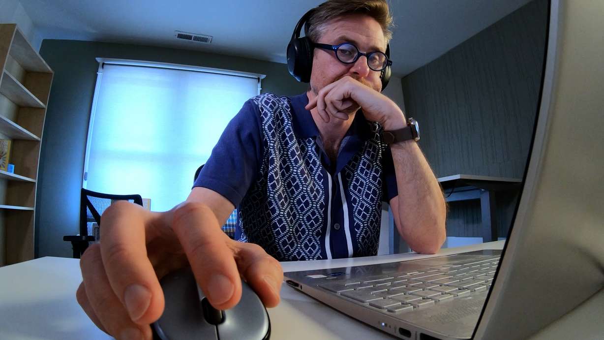 Brian Higgins works at his computer on Monday. Higgins, oddly enough, keeps him calm in stressful situations by working on multiple things at once.