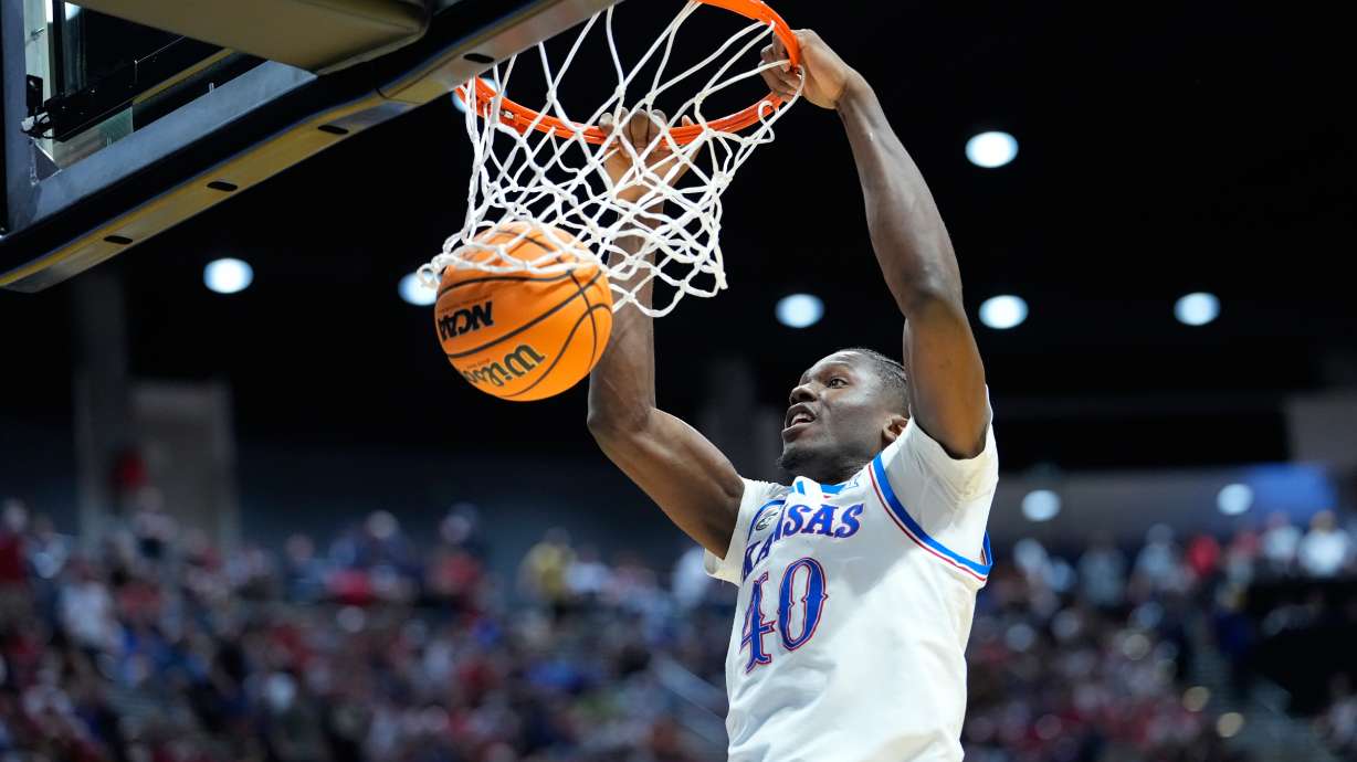 Kansas forward Flory Bidunga dunks against St. John's during the second half of a game in the second round of the NCAA college basketball tournament Sunday, March 22, 2026, in San Diego.