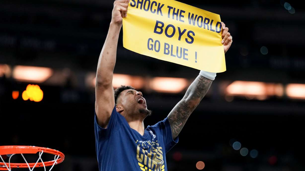 Michigan forward Yaxel Lendeborg celebrates after defeating UConn in the NCAA college basketball tournament national championship game at the Final Four, Monday, April 6, 2026, in Indianapolis.