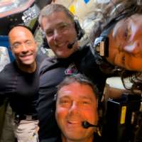 Artemis II astronauts make long-distance call to space station as they head home from the moon