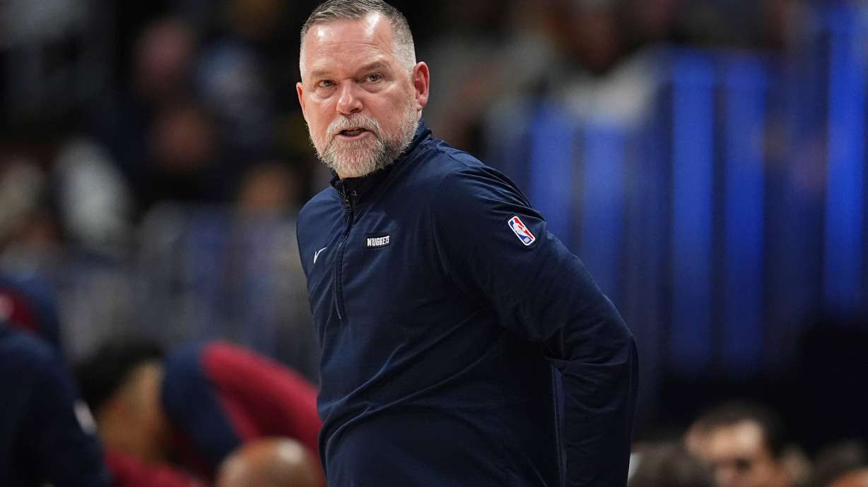 FILE - Denver Nuggets head coach Michael Malone stands on the sideline during the second half of an NBA basketball game April 1, 2025, in Denver.