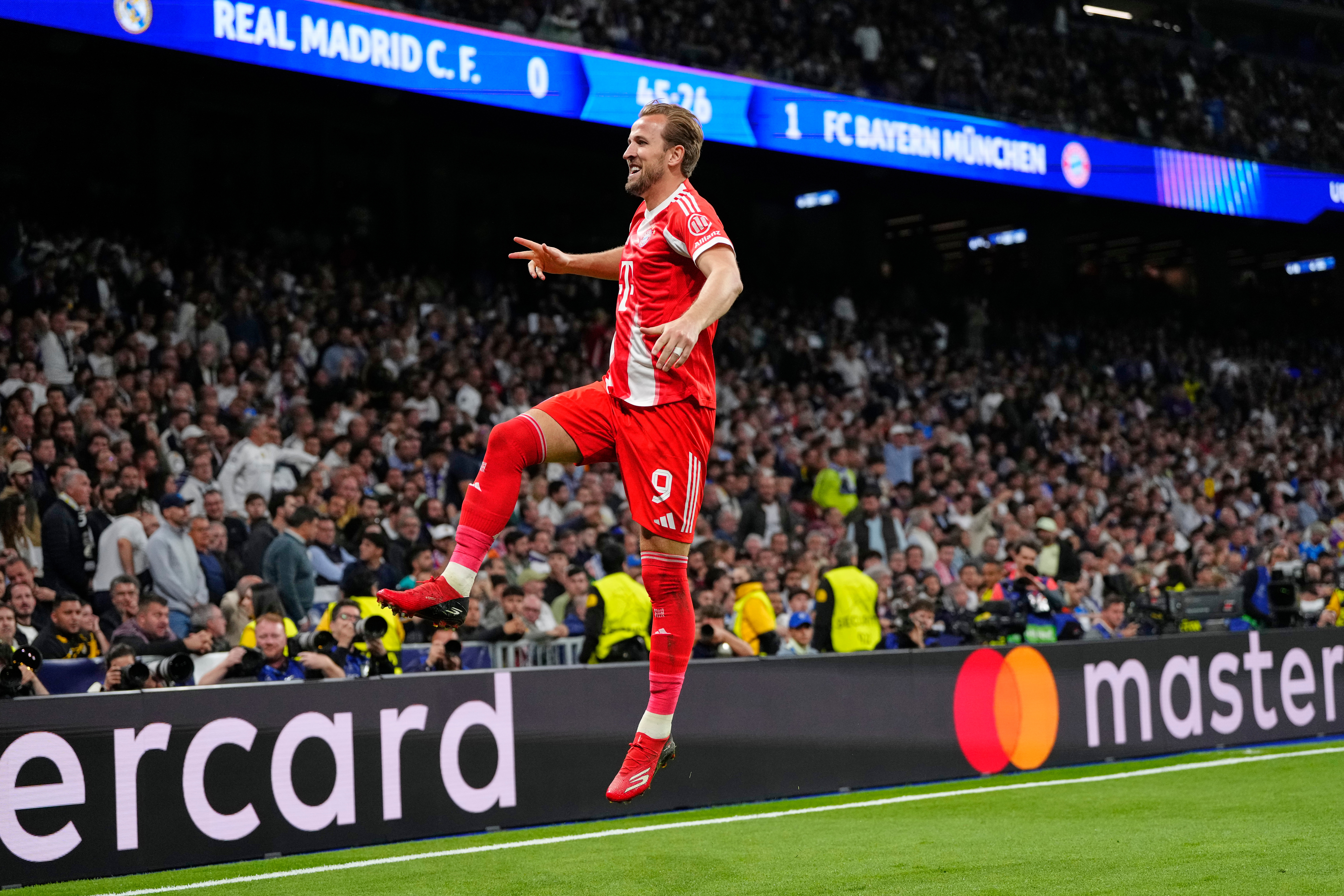 Bayern's Harry Kane celebrates scoring his side's second goal during the Champions League quarterfinal first leg soccer match between Real Madrid and Bayern Munich in Madrid, Spain, Tuesday, April 7, 2026. 