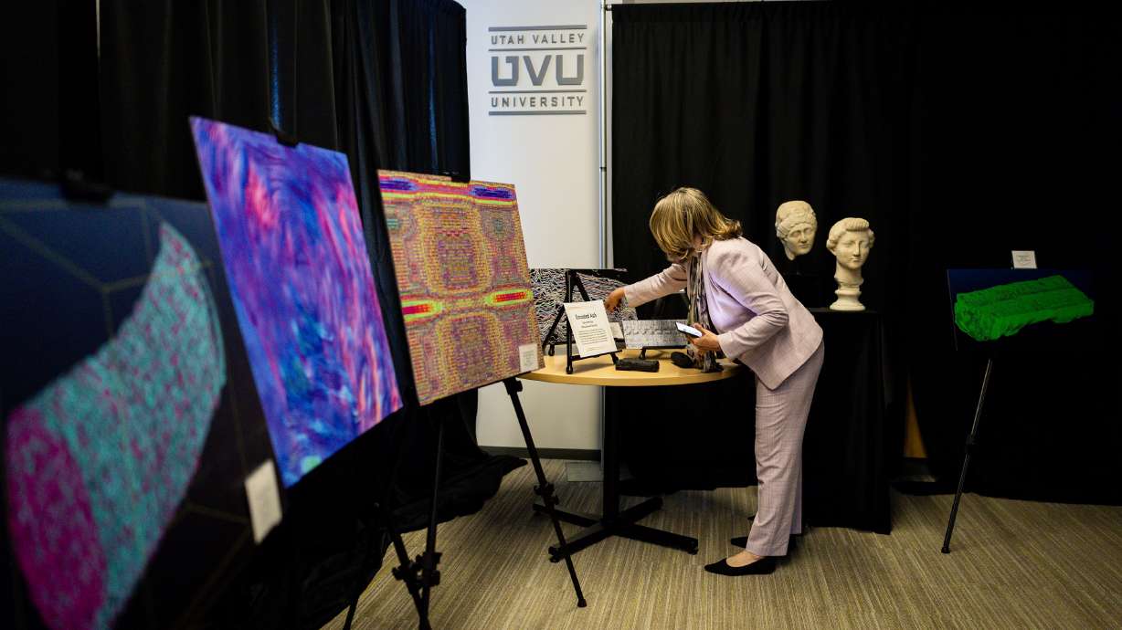 Christy Chapman, of the University of Kentucky, fixes images created by Vesuvius Challenge participants as part of an international Herculaneum Papyri and AI Conference at UVU on Tuesday.