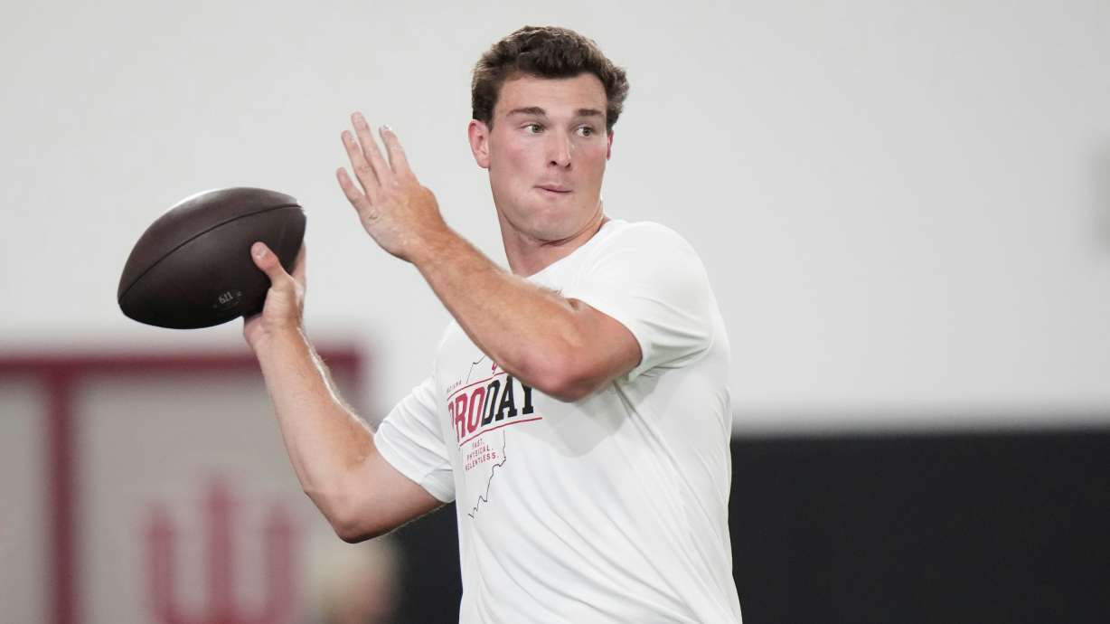 Indiana quarterback Fernando Mendoza looks to throw a pass during the school's NFL football pro day Wednesday, April 1, 2026, in Bloomington, Ind.