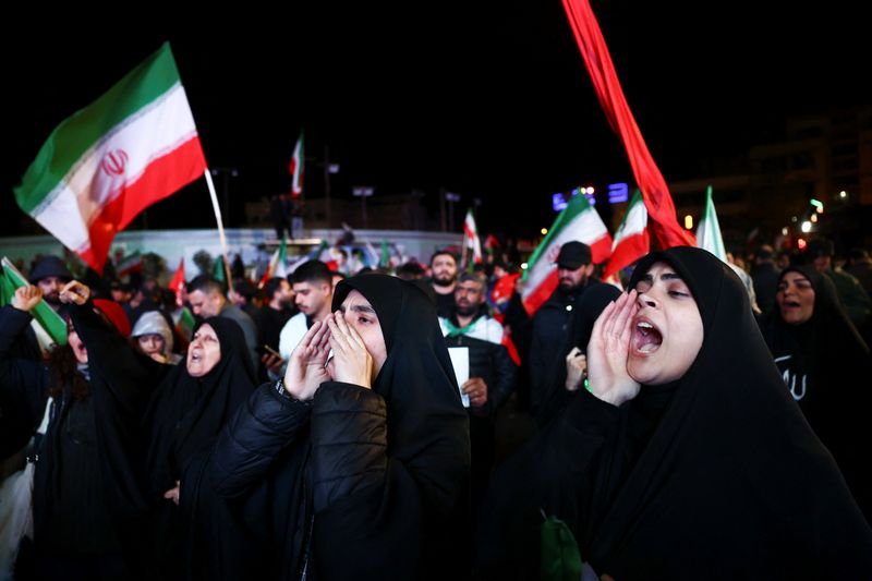 People gather after a two-week ceasefire in the Iran war was announced, in Tehran, Iran, Wednesday. President Donald Trump's announcement came two hours before Iran's deadline to reopen the Strait of Hormuz.
