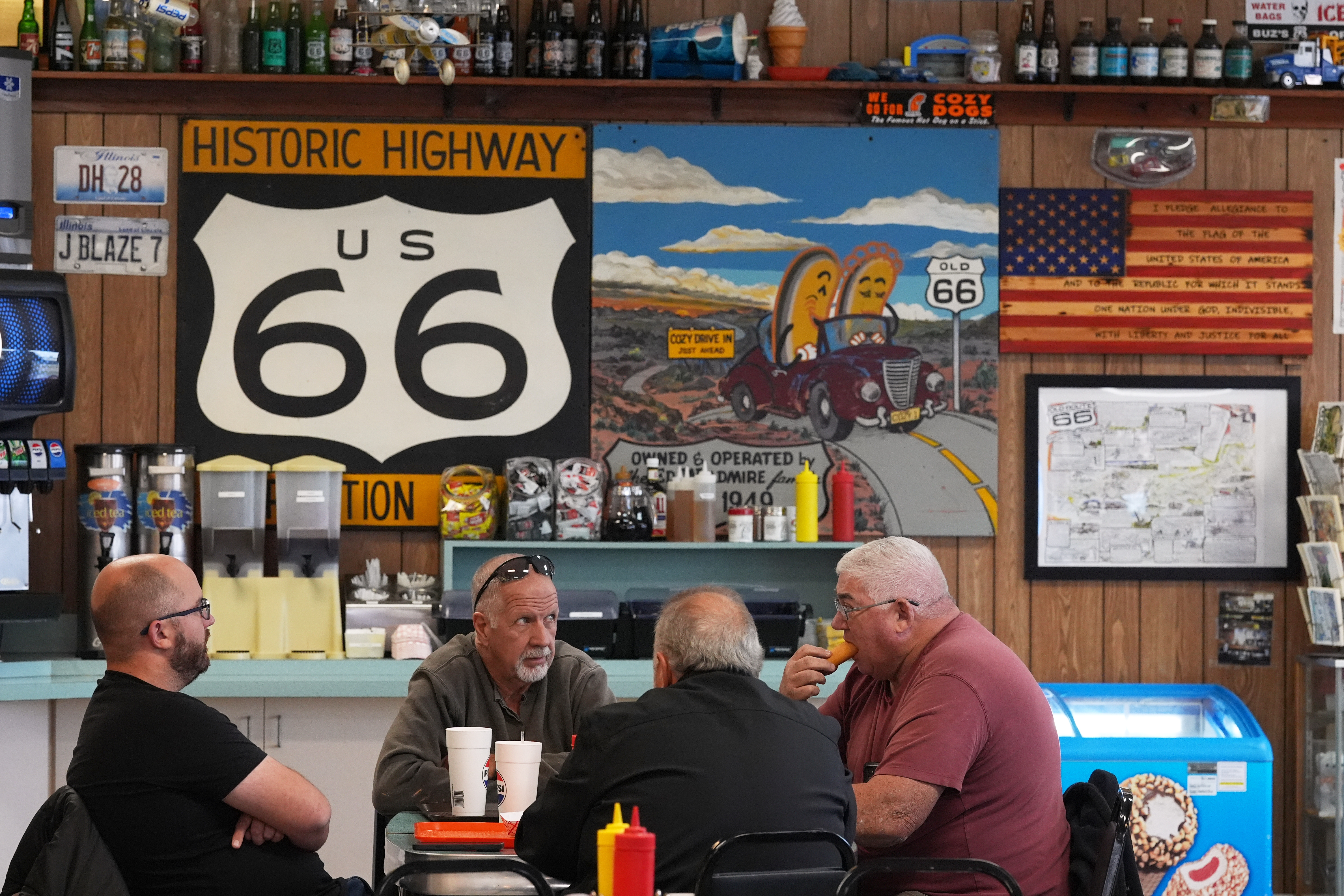 Customers at Cozy Dog Drive In have lunch in Springfield, Ill., Nov. 20. The drive-in has been part of the charm of Route 66 for over a century.