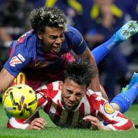 Atletico wins 2-0 at 10-man Barcelona in 1st leg of Champions League quarterfinal