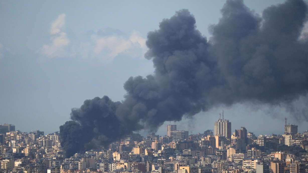 Smoke rises following an Israeli airstrike on a building in Beirut, Lebanon, Wednesday. Israeli strikes have hit central Beirut without warning, causing panic.