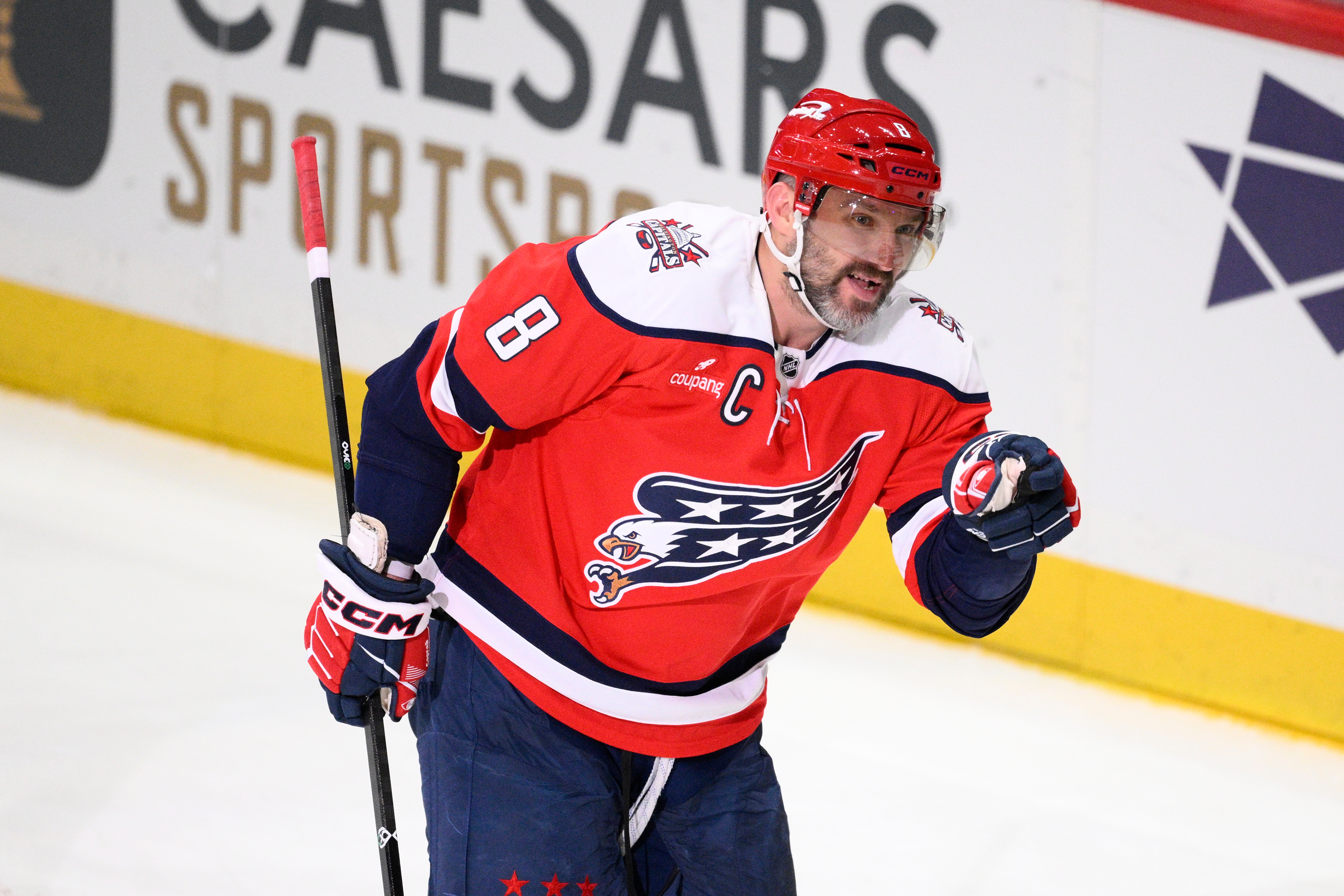 Washington Capitals left wing Alex Ovechkin motions to the crowd after he scored his 1,000th career goal combining regular season and playoffs during the third period of an NHL hockey game against the Colorado Avalanche, Sunday, March 22, 2026, in Washington.