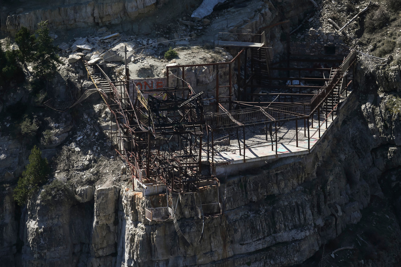 The remains of an old tram system still sits perched on a cliff at Bridal Veil Falls in Provo Canyon on Thursday, April 13, 2017. Recreation in the area will be closed for eight weeks to allow for the demolition of the structures at the top and bottom of the waterfall.