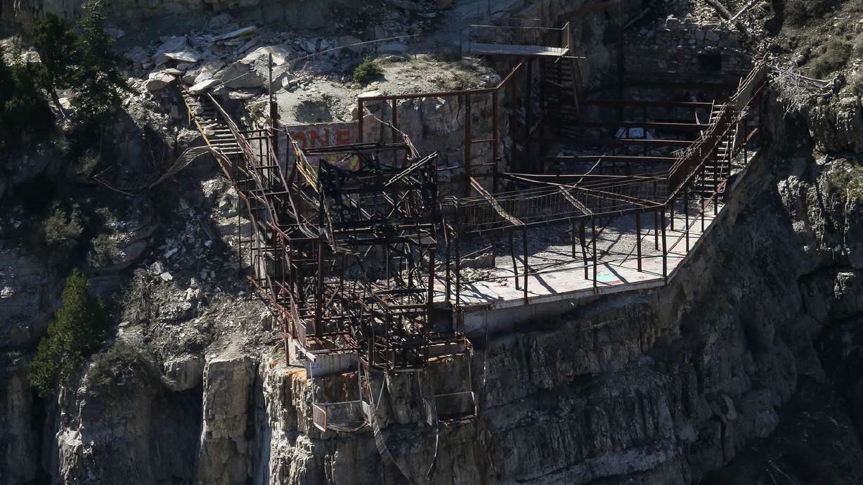 The remains of an old tram system still sits perched on a cliff at Bridal Veil Falls in Provo Canyon on Thursday, April 13, 2017. Recreation in the area will be closed for eight weeks to allow for the demolition of the structures at the top and bottom of the waterfall.