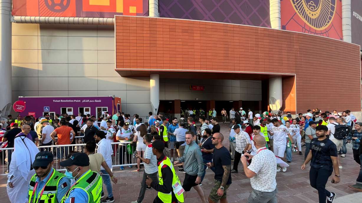 FILE - Fans arrive for the World Cup group B soccer match between England and Iran at the Khalifa International Stadium Doha, Qatar, Monday, Nov. 21, 2022.