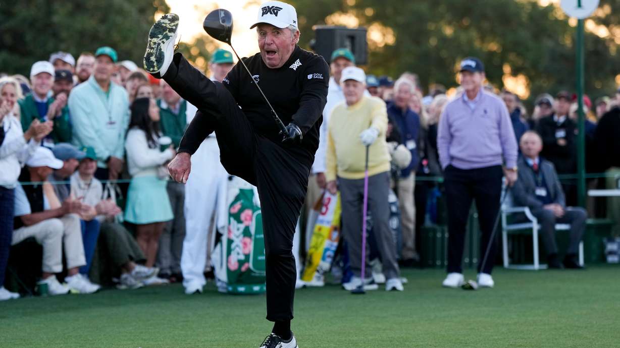 Gary Player kicks his leg in the air after hitting the ceremonial tee shot on the first hole during the first round of the Masters golf tournament at the Augusta National Golf Club, Thursday, April 9, 2026, in Augusta, Ga.