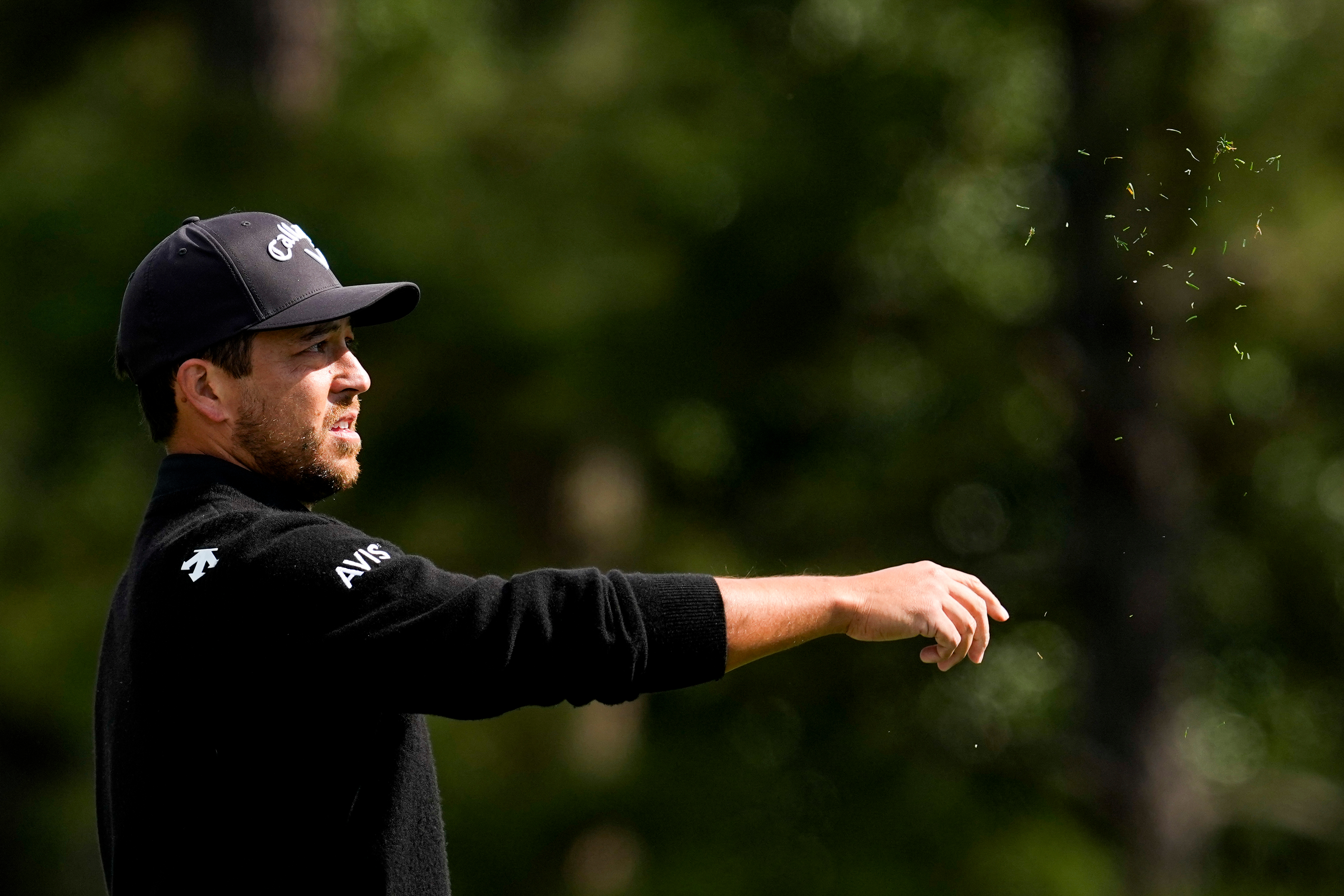 Xander Schauffele checks the wind on the first hole during the first round of the Masters golf tournament at the Augusta National Golf Club, Thursday, April 9, 2026, in Augusta, Ga. 
