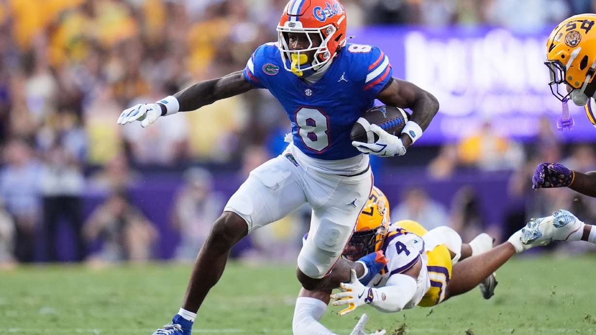FILE - Florida wide receiver Vernell Brown III (8) carries against LSU cornerback Mansoor Delane (4) in the first half of an NCAA college football game, Sept. 13, 2025, in Baton Rouge, La.