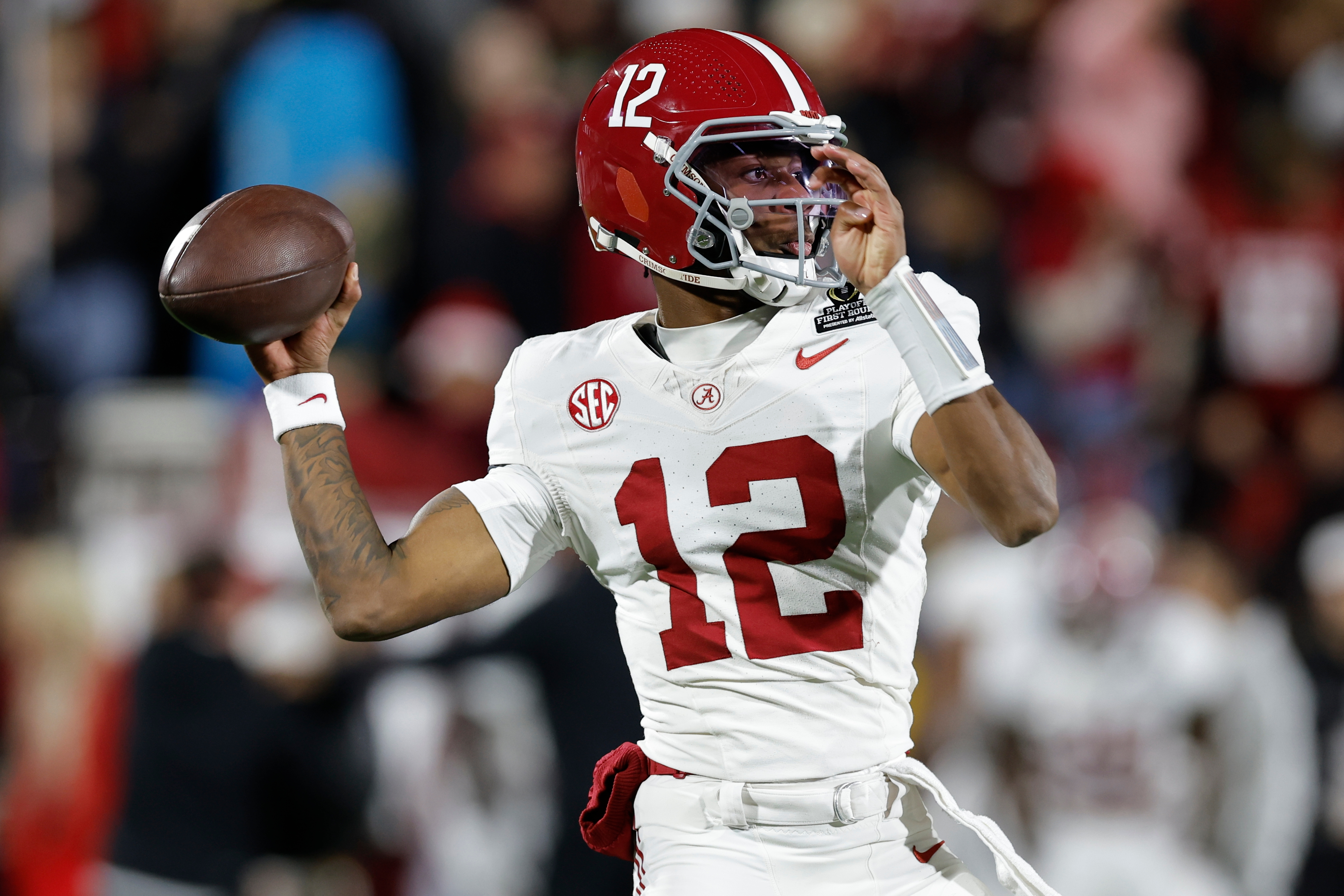 FILE - Alabama quarterback Keelon Russell (12) warms up before the first round of an NCAA College Football Playoff against Oklahoma, Friday, Dec. 19, 2025, in Norman, Okla. 
