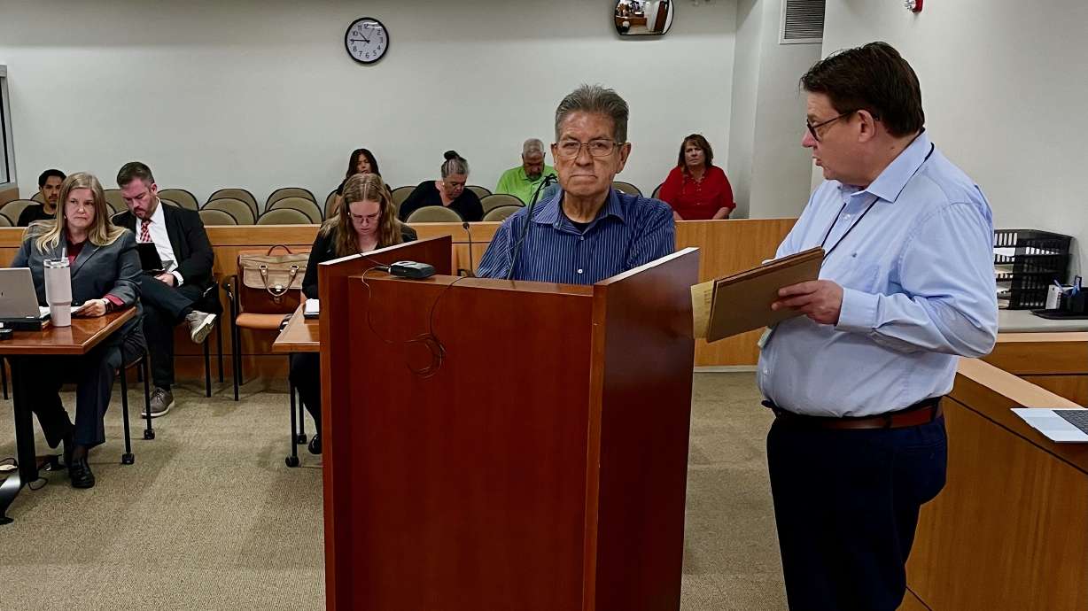 Manuel Salgado-Vargas, center, appears in justice court on July 15, 2025. He pleaded guilty in Ogden Justice Court on Wednesday to 38 charges in his dog-hoarding case.