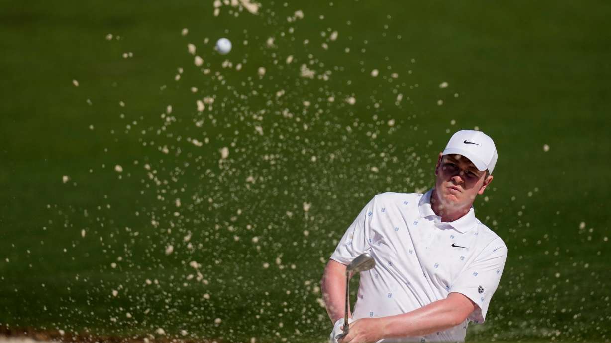 Robert MacIntyre, of Scotland, hits from the bunker on the second hole during the second round of the Masters golf tournament at the Augusta National Golf Club, Friday, April 10, 2026, in Augusta, Ga.