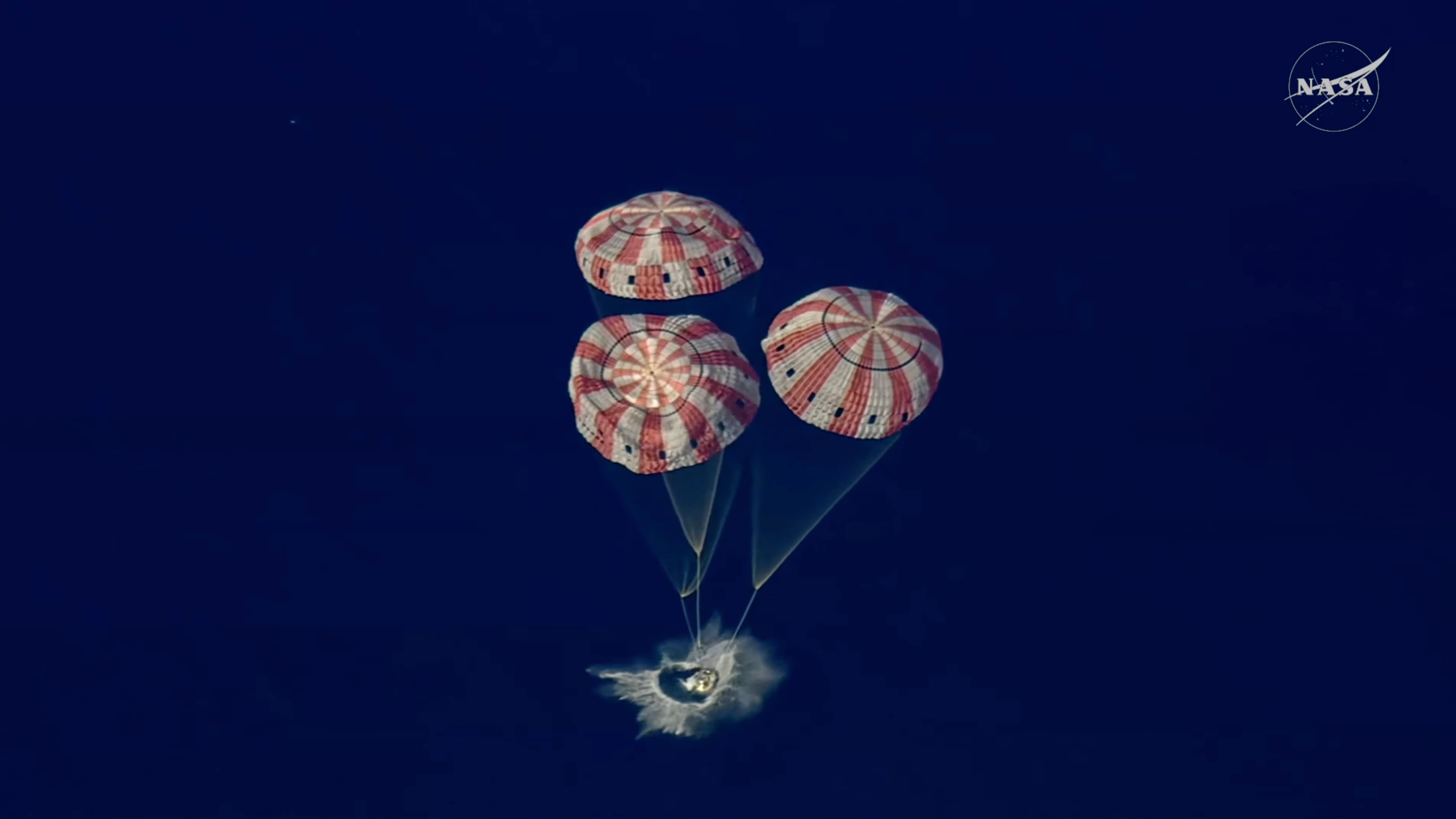 Artemis II returns from moon with splashdown to close out record-breaking lunar voyage