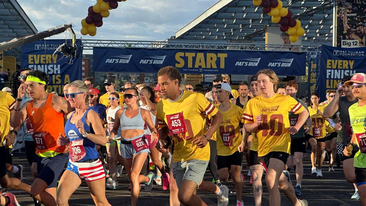 Runners take off at the start line of Pat's Run, a 4.2-mile race honoring former NFL player and Army Ranger Pat Tillman, in Tempe, Ariz., on Saturday, April 11, 2026.