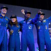 Artemis II's moon-traveling astronauts return home to cheers after a record-breaking trip