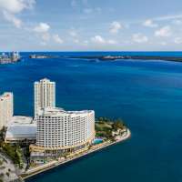 A 23-story hotel in exclusive Miami locale vanishes in seconds with implosion