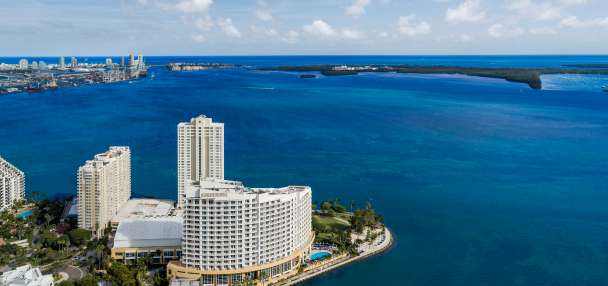 A 23-story hotel in exclusive Miami locale vanishes in seconds with implosion