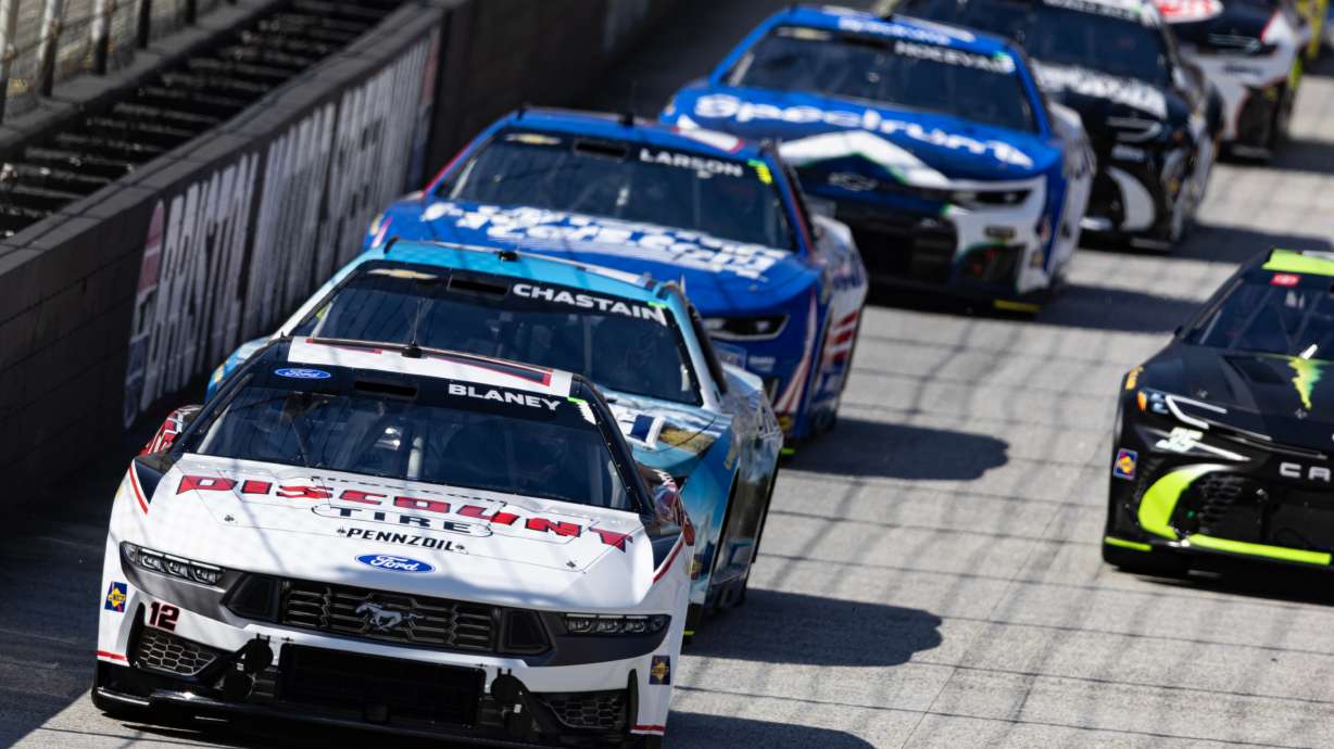 Ryan Blaney (12) leads Ross Chastain and the rest of the field during the start of a NASCAR Cup Series auto race, Sunday, April 12, 2026, in Bristol, Tenn.