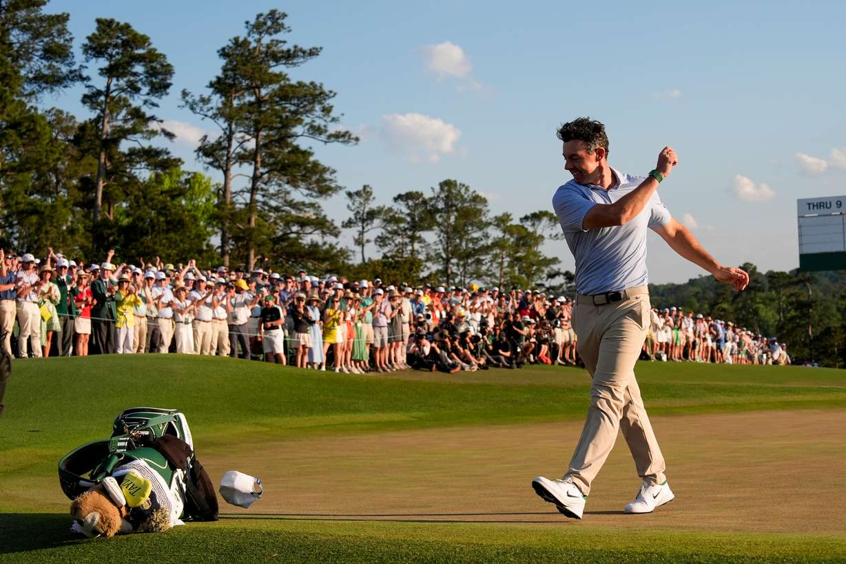 Rory McIlroy, of Northern Ireland, celebrates after winning the Masters golf tournament at the Augusta National Golf Club, Sunday, April 12, 2026, in Augusta, Ga.