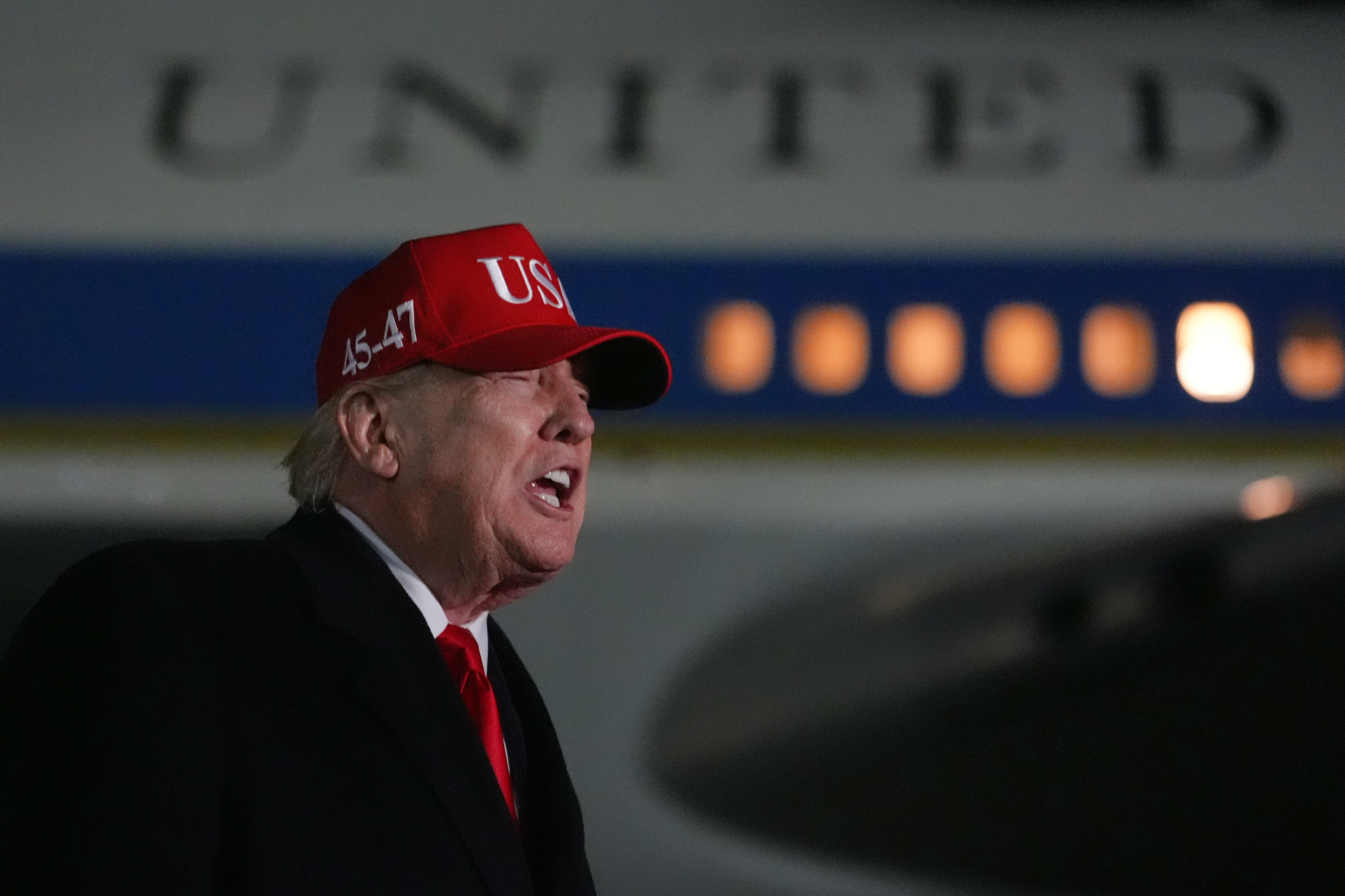 President Donald Trump speaks with reporters at Joint Base Andrews, Md., Sunday, after he returned from Miami. Trump is refusing to apologize to Pope Leo XIV after criticizing the pontiff's opposition to the war in Iran.