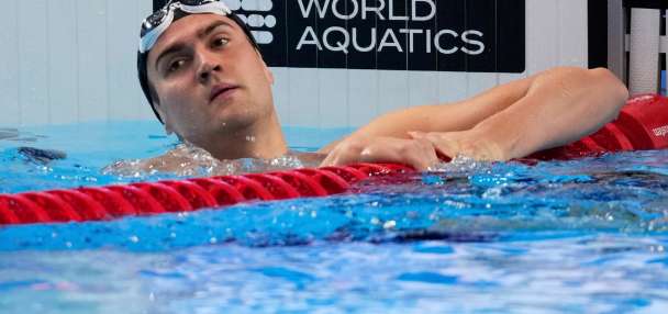 Russian swimmers get flag and anthem back as a key Olympic sport drops its restrictions