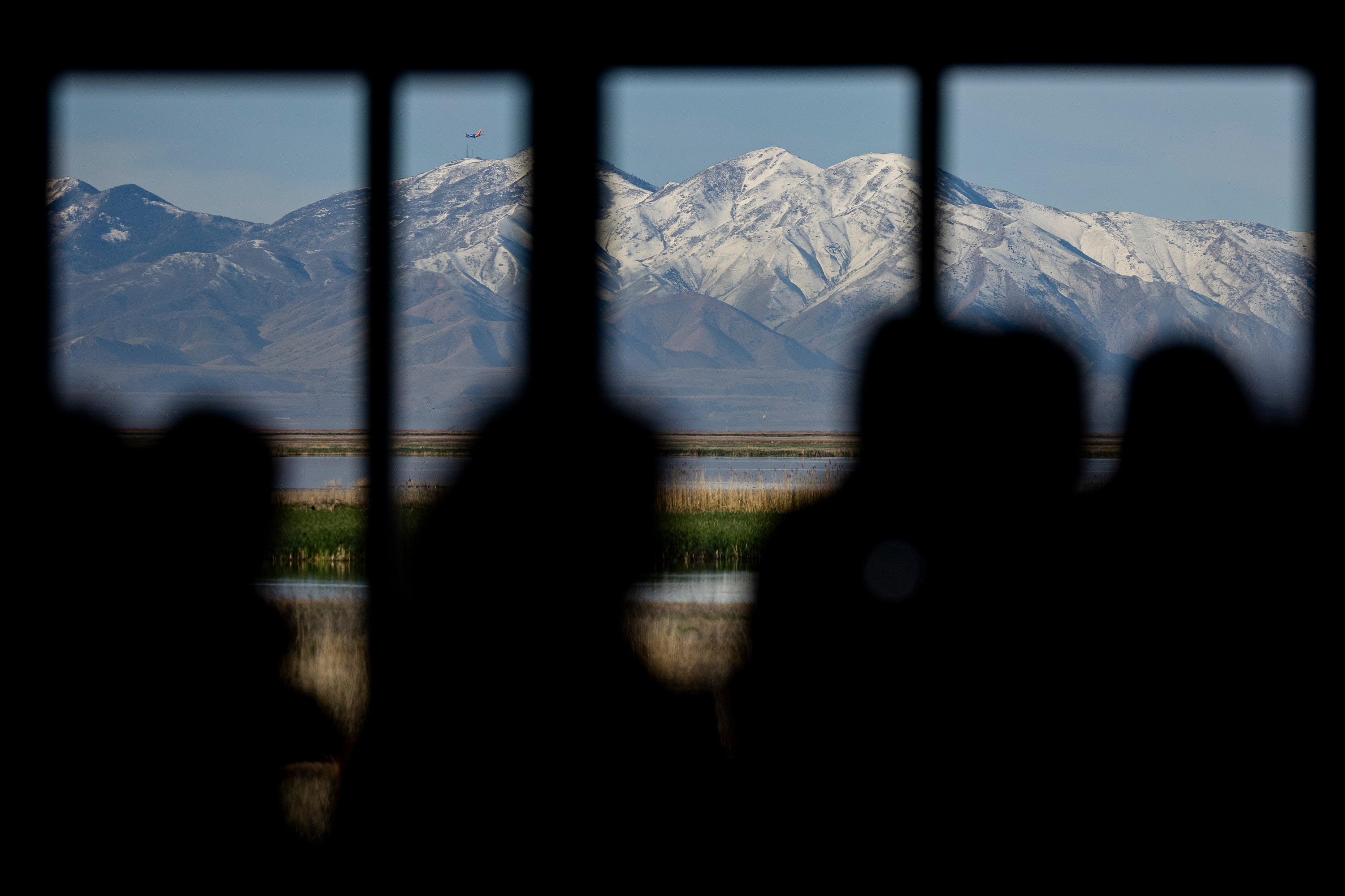 People gather at the Eccles Wildlife Education Center in Farmington for an event announcing donations to Great Salt Lake Rising from Larry H. and Gail Miller Family Foundation, Maverik and The J. Willard and Alice S. Marriott Foundation on Monday.