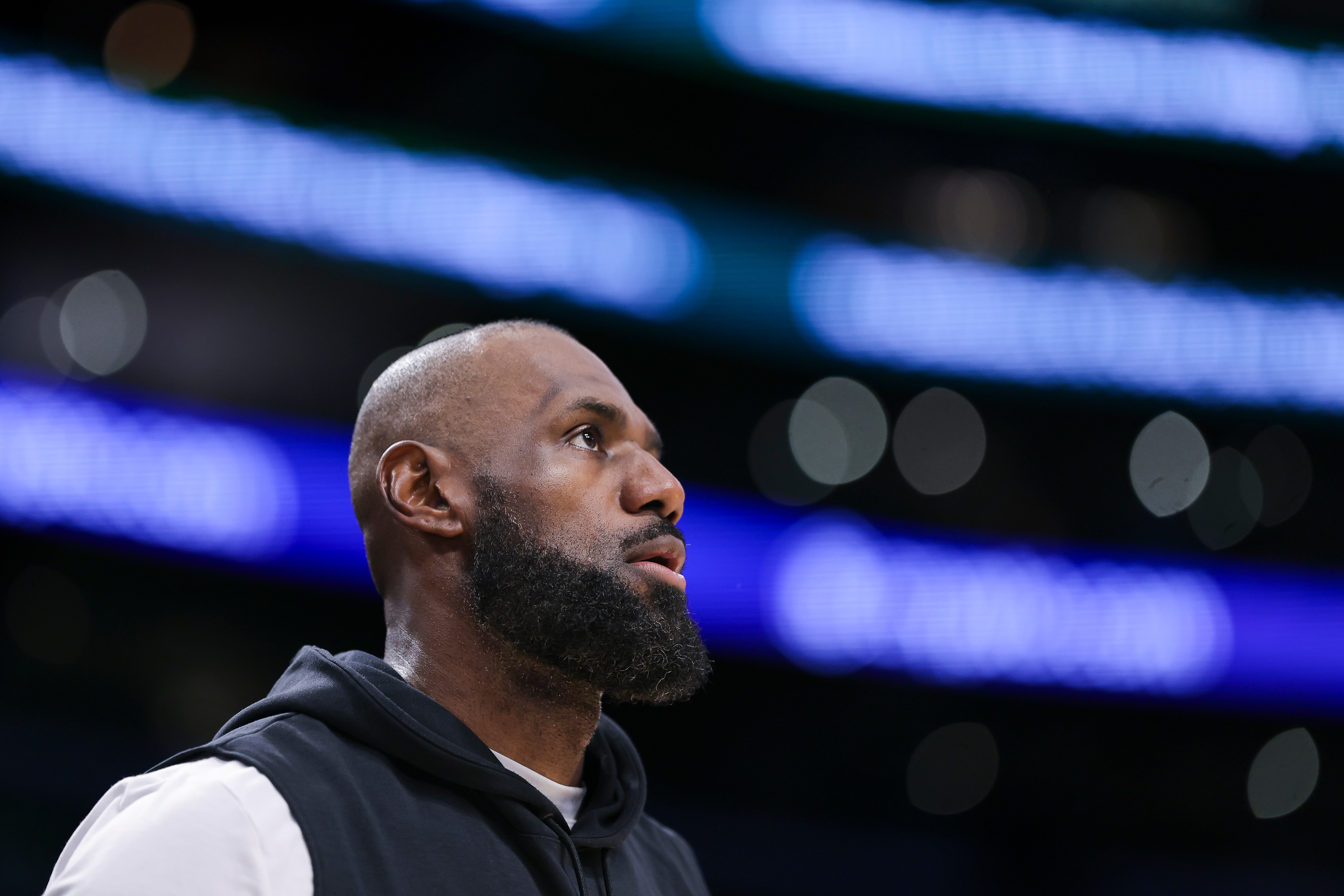 Los Angeles Lakers forward LeBron James looks on before an NBA basketball game against the Phoenix Suns, Friday, April 10, 2026, in Los Angeles. 