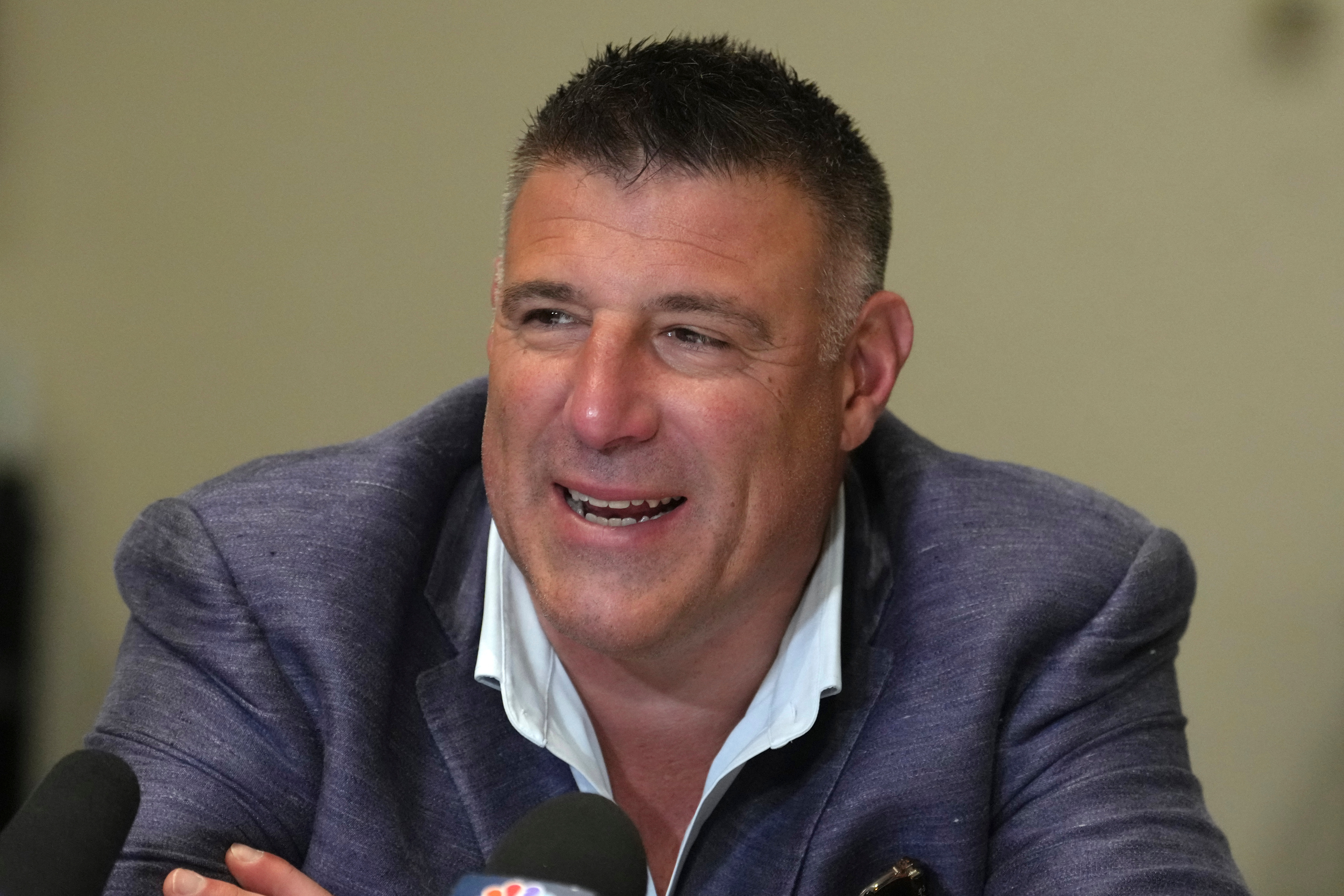 New England Patriots head coach Mike Vrabel speaks to reporters at the NFL football annual meetings, Tuesday, March 31, 2026, in Phoenix. 