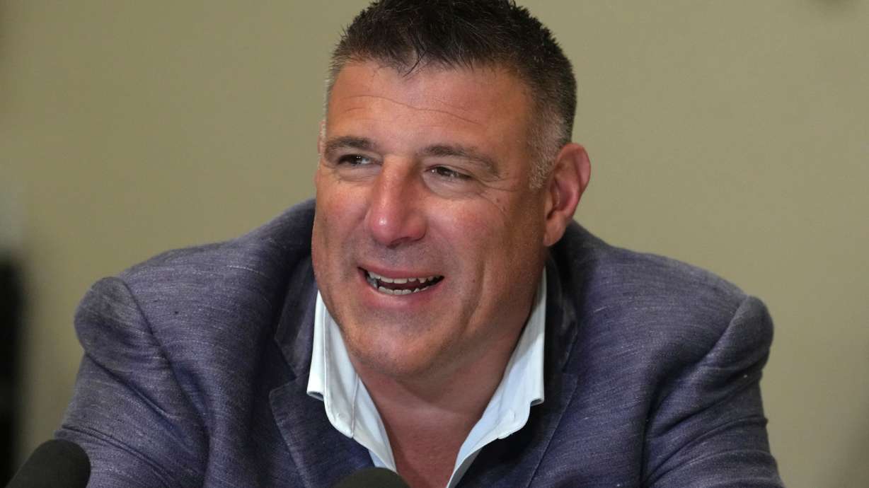 New England Patriots head coach Mike Vrabel speaks to reporters at the NFL football annual meetings, Tuesday, March 31, 2026, in Phoenix.