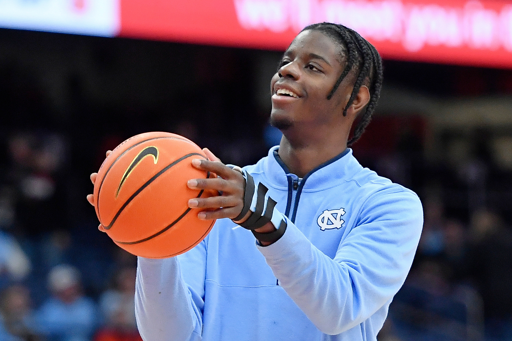 FILE - North Carolina forward Caleb Wilson (8) shoots before an NCAA college basketball game against Syracuse, Saturday, Feb. 21, 2026, in Syracuse, N.Y. 