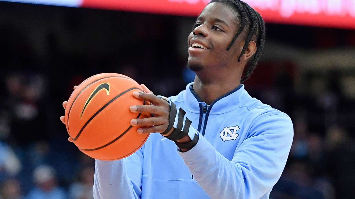 FILE - North Carolina forward Caleb Wilson (8) shoots before an NCAA college basketball game against Syracuse, Saturday, Feb. 21, 2026, in Syracuse, N.Y.