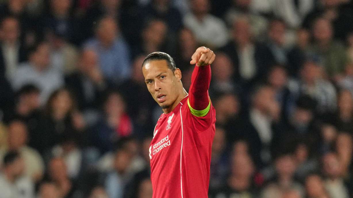 Liverpool's Virgil van Dijk gestures during the Champions League quarterfinal first leg soccer match between Paris Saint-Germain and Liverpool in Paris, Wednesday, April 8, 2026.