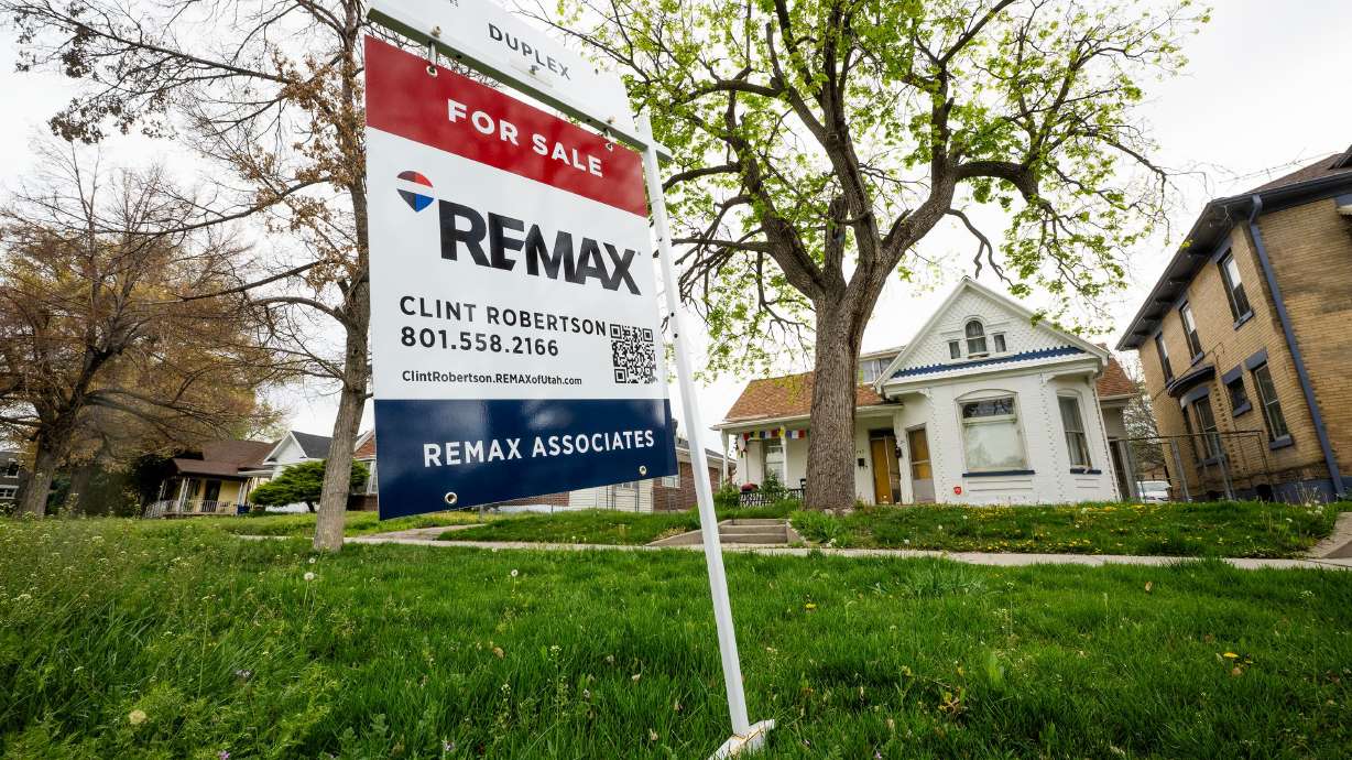 An expert is stepping back from his optimistic prediction for the U.S. housing market this year, thanks in part to the Iran war.