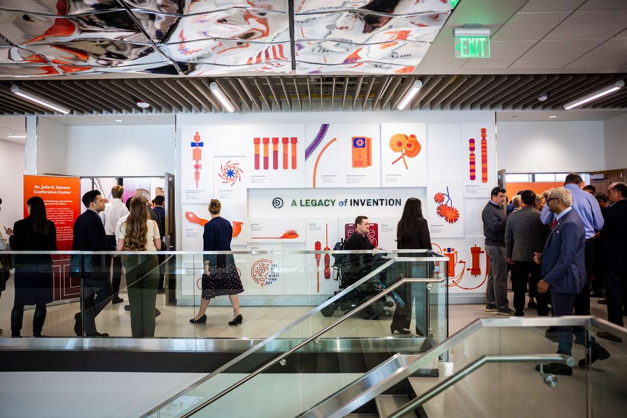 People arrive to a formal dedication event at the James Levoy Sorenson Center for Medical Innovation in Salt Lake City on Tuesday. The nearly 60,000-square-foot, four-level center is designed to accelerate medical research, medical device development and life sciences training.