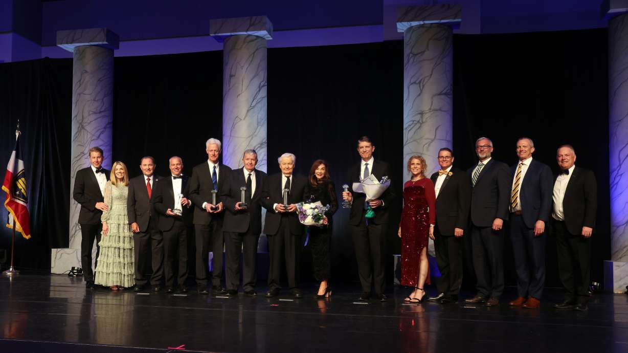 Former BYU presidents or those representing them appear on stage during a ceremony to honor their contributions, during Utah Valley Chamber’s Pillar of the Valley event at the Utah Valley Convention Center in Provo on Tuesday.