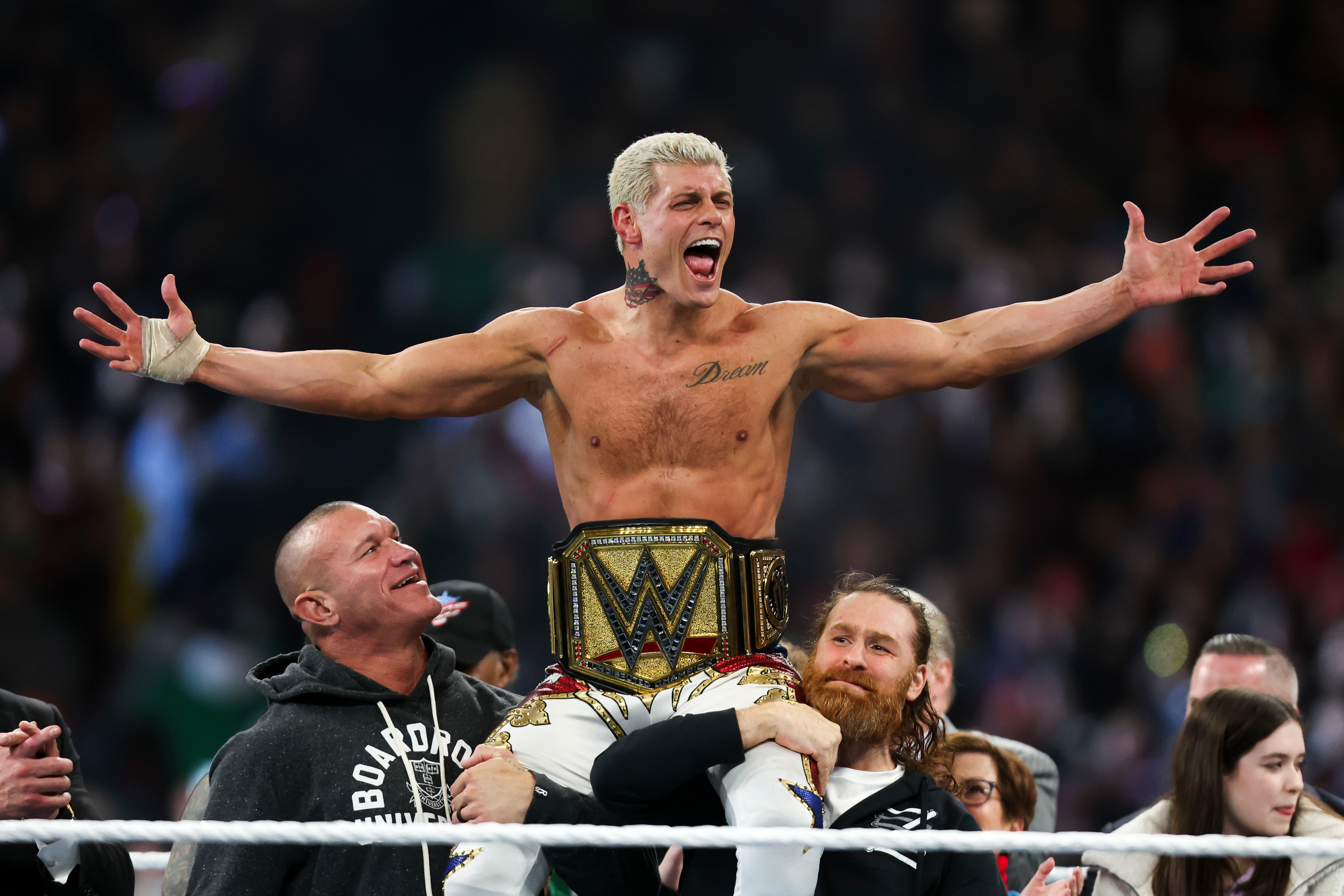 FILE - Cody Rhodes celebrates after winning the Undisputed WWE universal championship match during WrestleMania 40 in Philadelphia, on April 7, 2024.