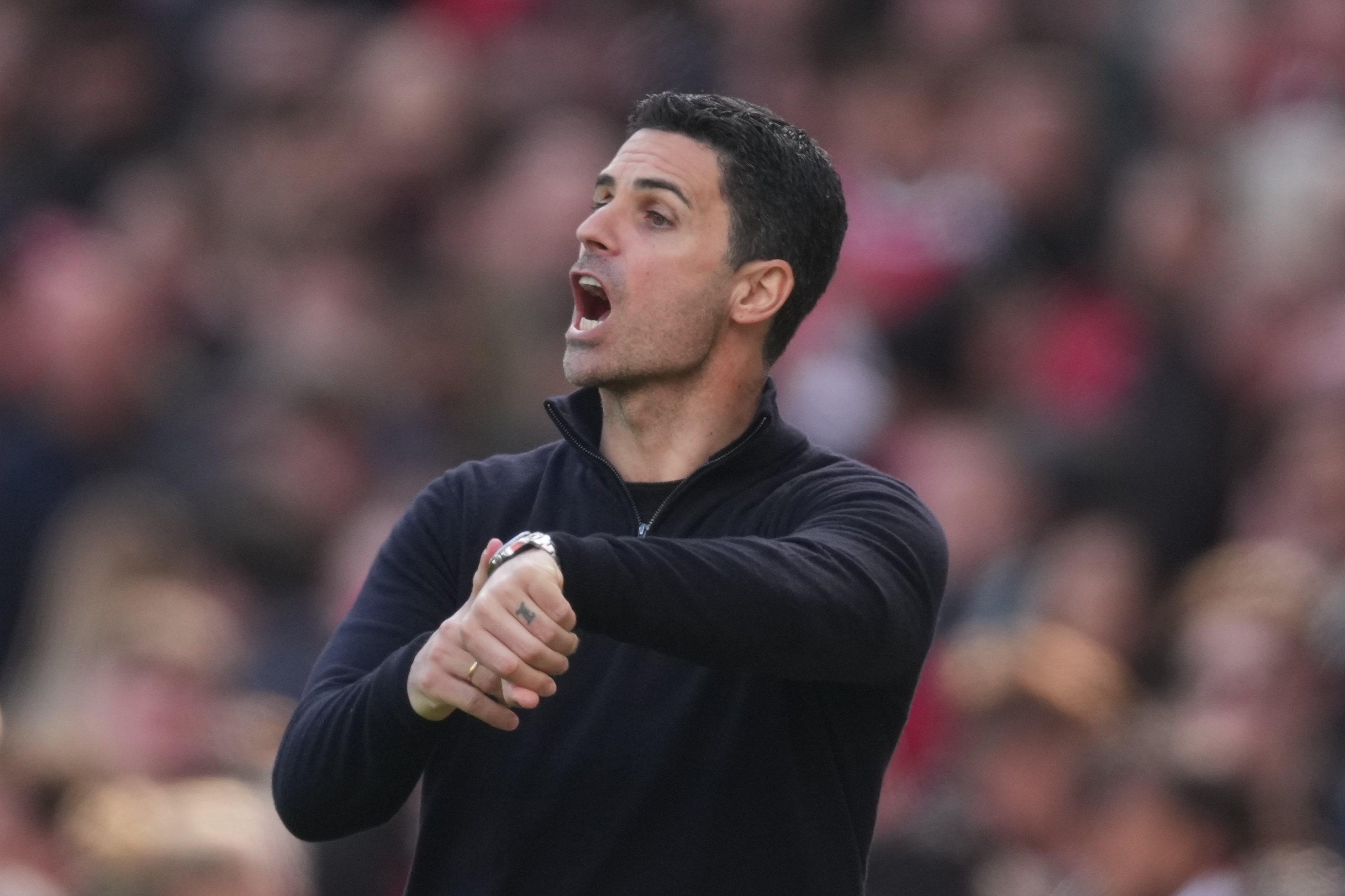 Arsenal's manager Mikel Arteta reacts during the Premier League soccer match between Arsenal and Bournemouth in London, England Saturday, April 11, 2026.