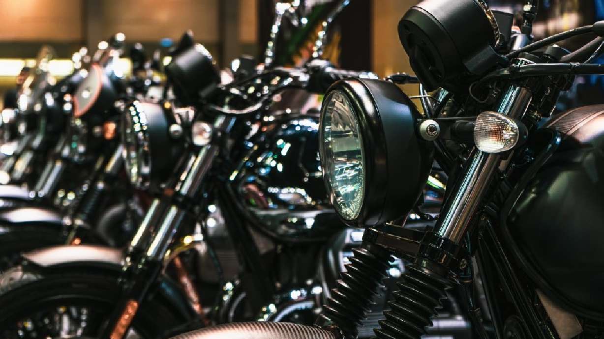 A line of motorcycles is pictured. The Transportation Interim Committee on Wednesday voted to advance a proposal which would permanently allow lane filtering while also expanding the areas where it is permitted.