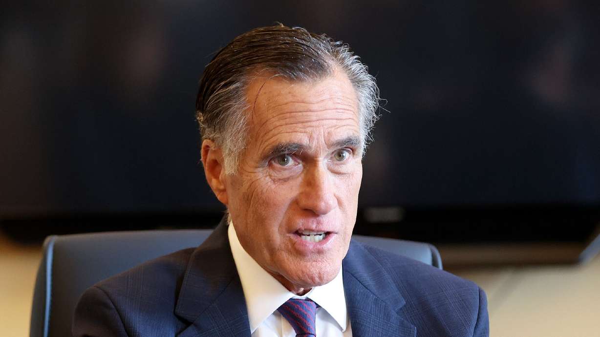 Then-Sen. Mitt Romney, R-Utah, meets with Senate Democrats during their caucus meeting at the Capitol in Salt Lake City on Feb. 15, 2024. Romney said at a discussion at Harvard University's Kennedy School that America's best days are ahead of it.